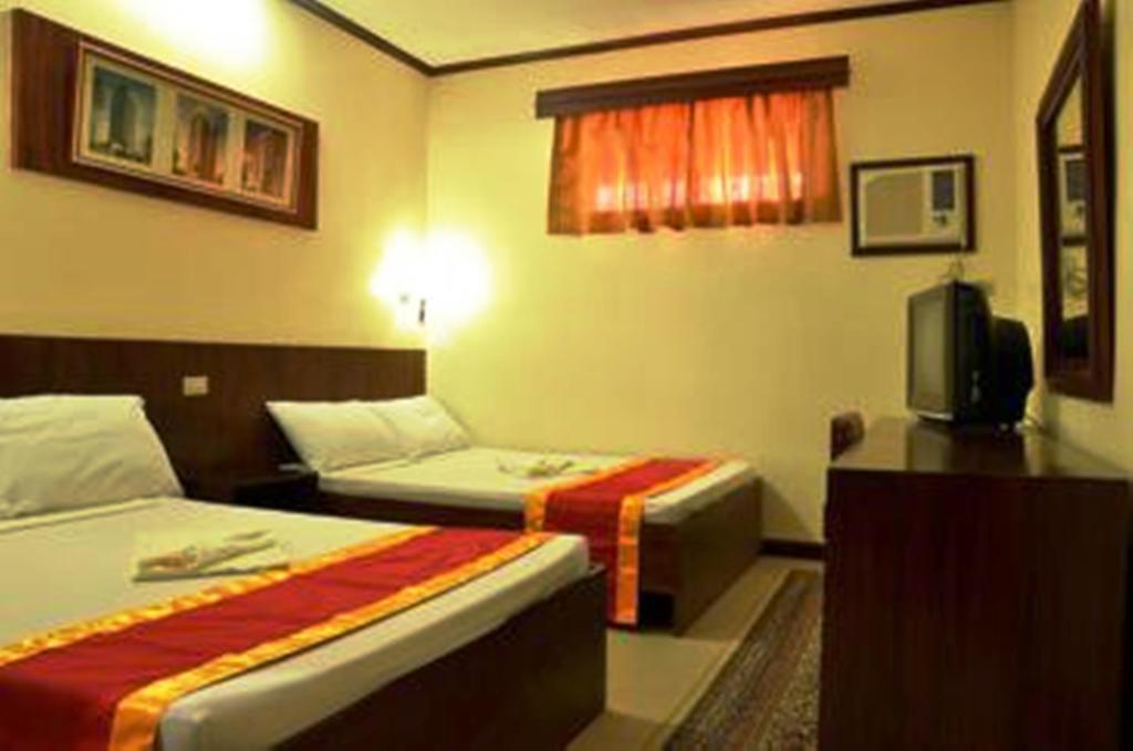 Ysabelle Mansion Bed & Breakfast Puerto Princesa Ruang foto