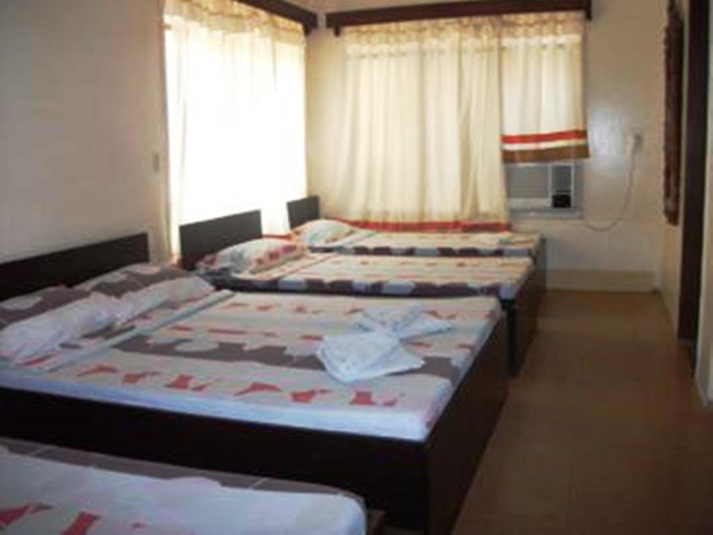 Ysabelle Mansion Bed & Breakfast Puerto Princesa Ruang foto